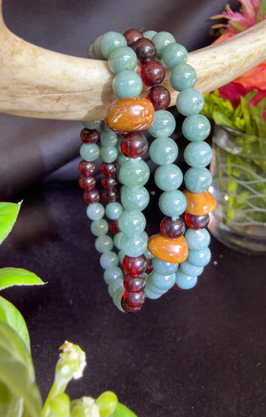 Blue Water Jade with Garnet and Coquilla Nut Bracelets
